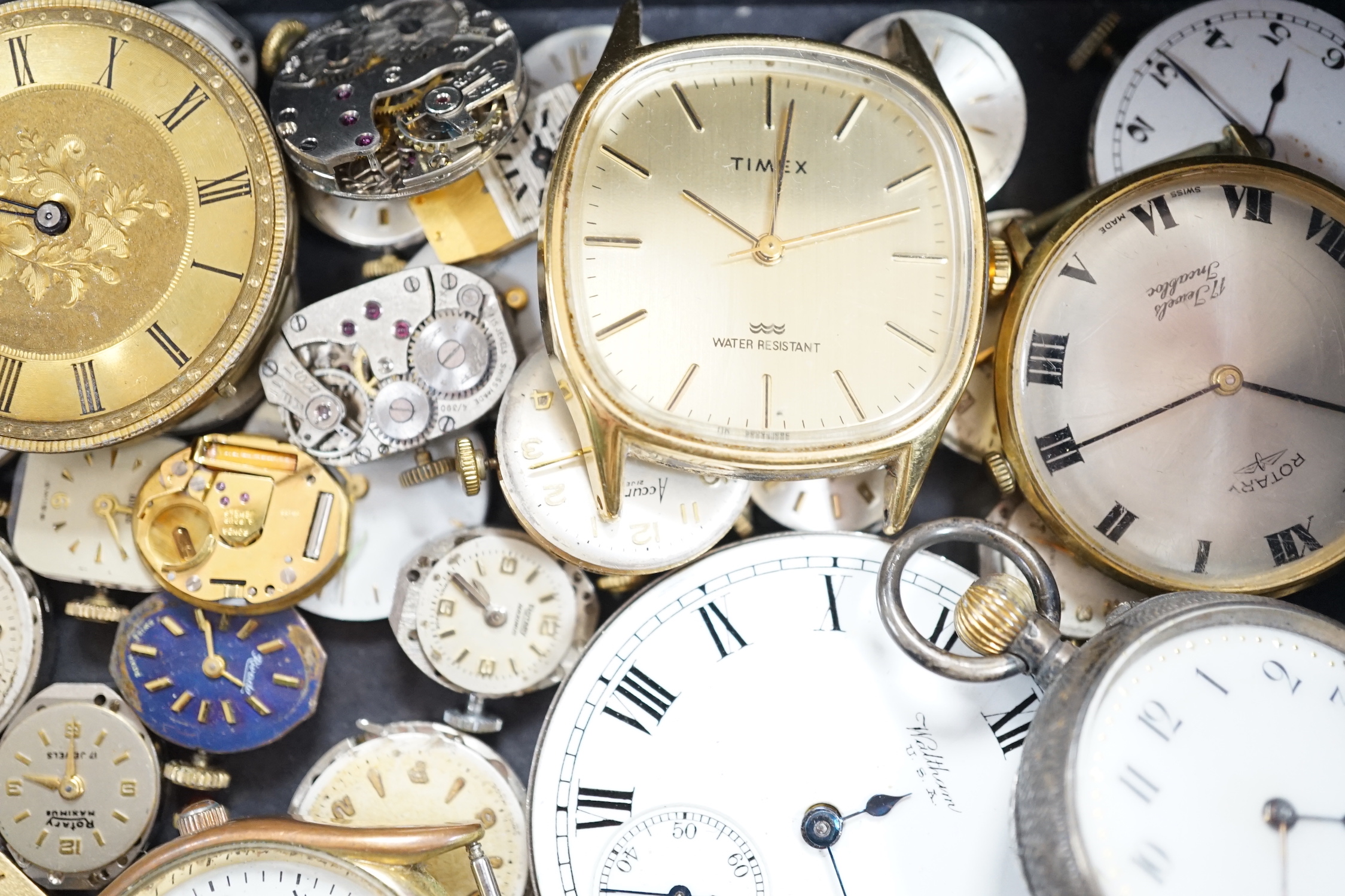 Assorted wrist wand pocket watch movements including Waltham and Rotary and a Swiss 935 standard fob watch.